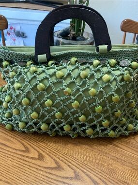 The Sak Olive Green Handbag with Wooden Bead Netting and Dark Wood Handles